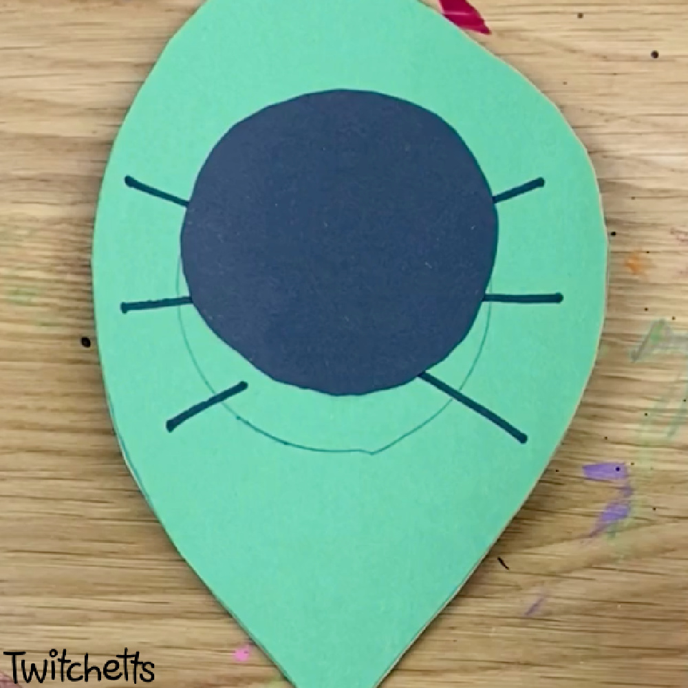 In Process image of a paper ladybug craft preschool kids can make