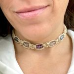 Woman wearing a hemp choker necklace with beads.