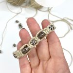 Hemp bracelet with beads. Text reads "Hemp bracelet with beads"